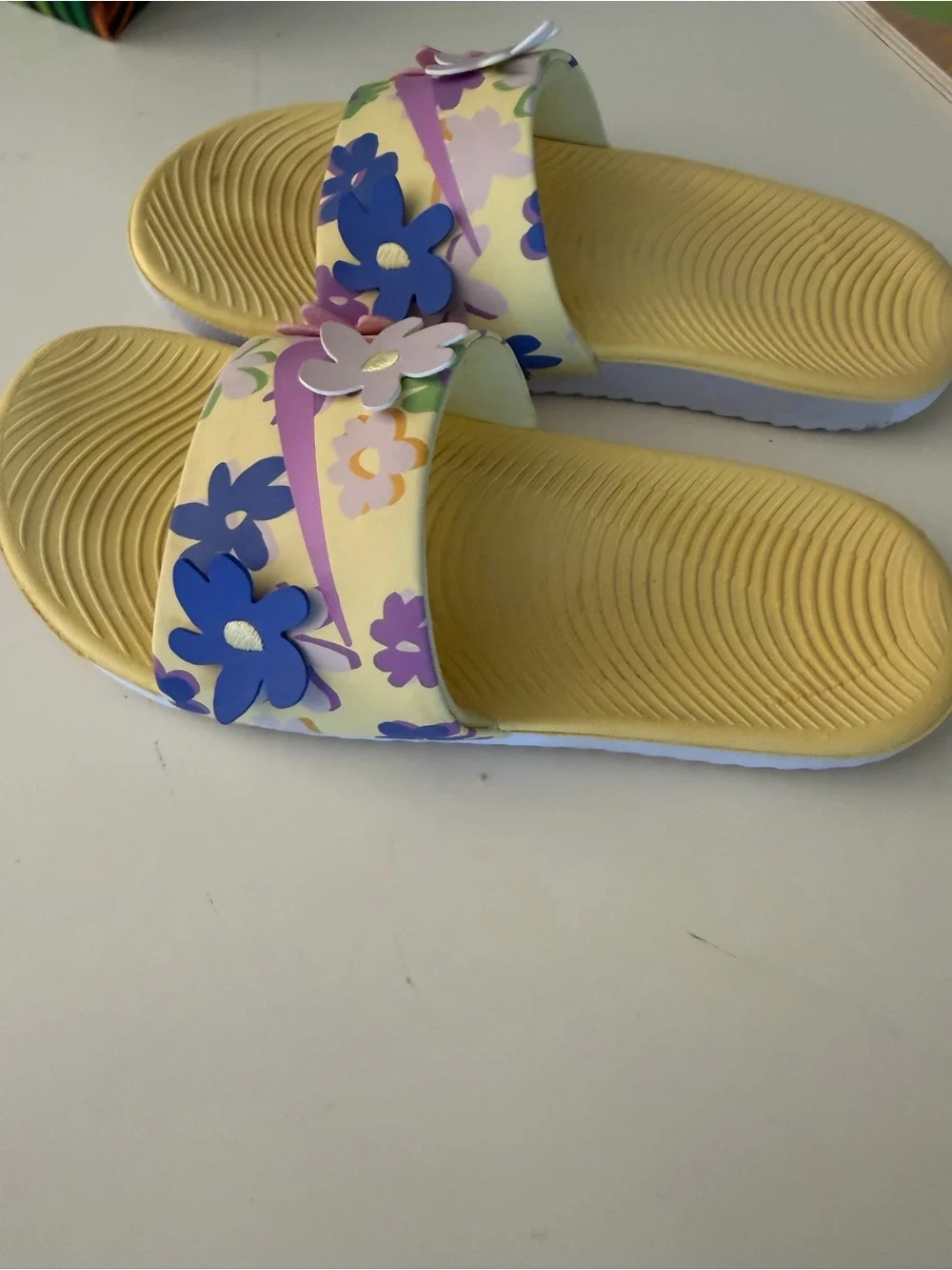Nike kawa  Slide Sandals in Cream with Purple and Blue Floral Accents